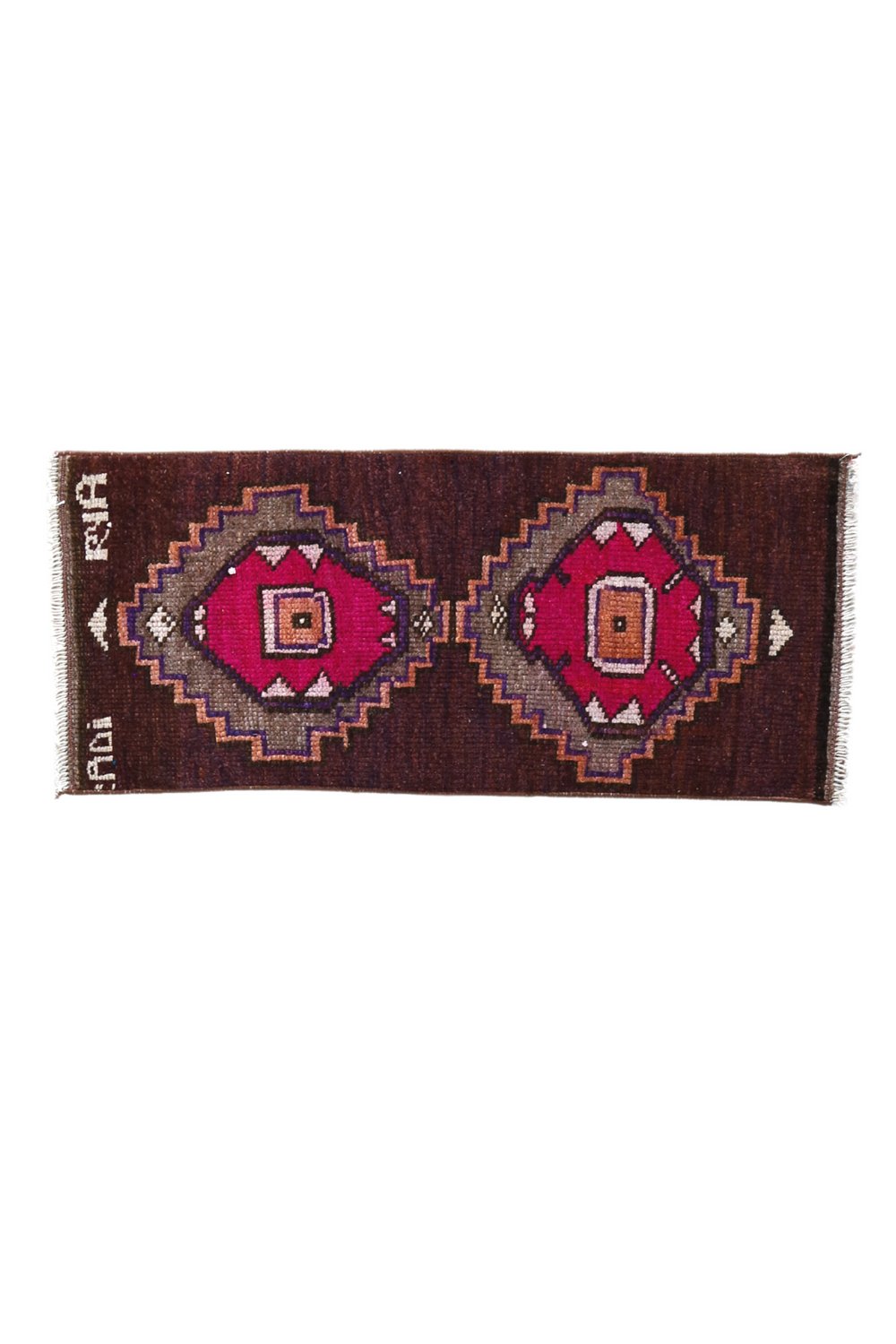 No. 1709 Mini Turkish Vintage Rug - 1'4" x 3'0" - Canary Lane
"Rectangular handwoven rug with a rich brown background, featuring two bold geometric medallions in magenta and orange tones, framed by intricate zigzag patterns and small decorative accents.