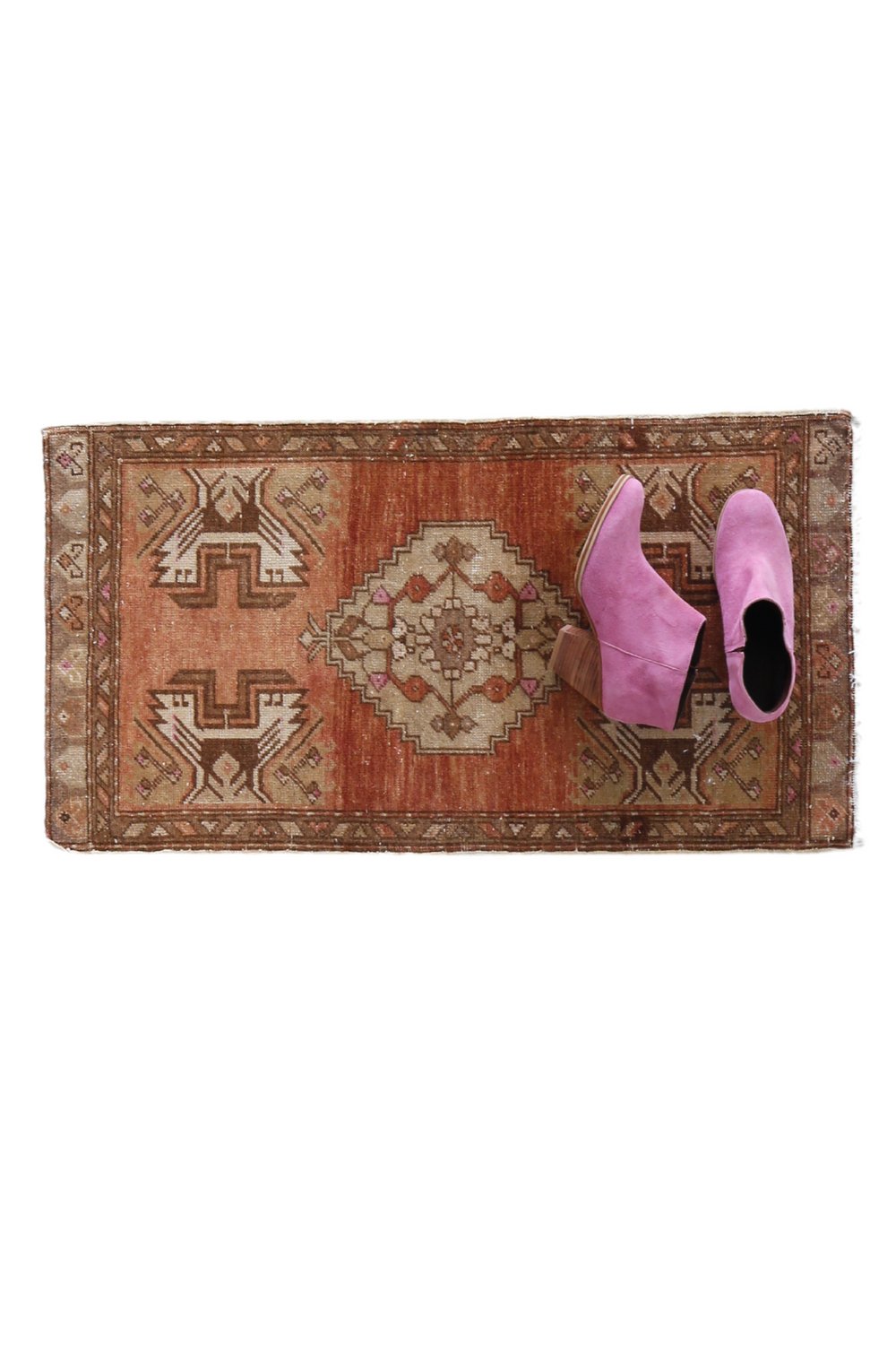 No. 1715 Mini Turkish Vintage Rug - 1'7" x 3'0" - Canary Lane
Vintage-style rectangular rug with warm terracotta tones, featuring a central medallion design in beige and brown, flanked by geometric motifs and intricate border detailing in earthy hues.